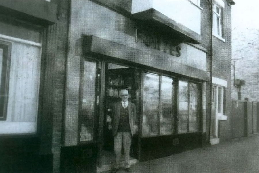 Giulio outside shop.